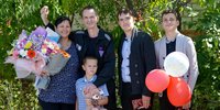 Maksim Beltikov with his wife Mariya and their three sons