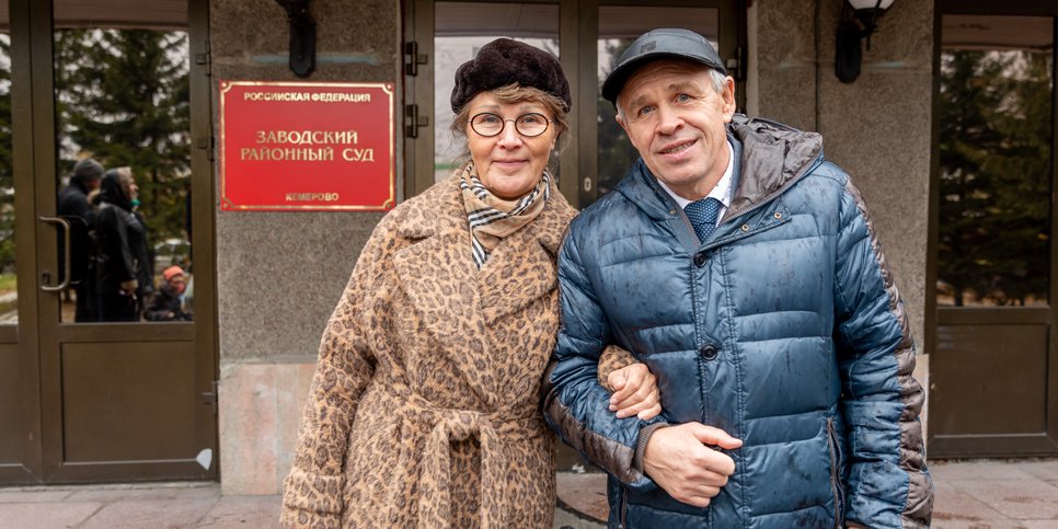 Vladimir Baykalov with his wife next to the courthouse