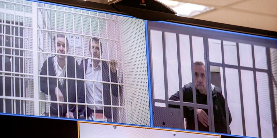 From left to right: Sergey Tolokonnikov, Roman Mareyev and Anatoliy Marunov participate in the appeal hearing via video conferencing from the pretrial detention center